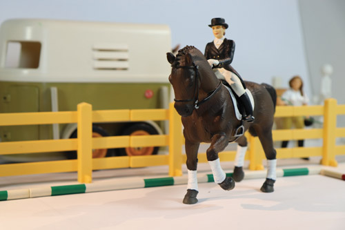 Rider and horse engaged in dressage Rider and horse engaged in dressage