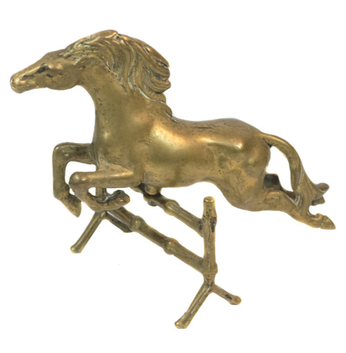 Brass horse in obstacle jump Brass horse in obstacle jump
